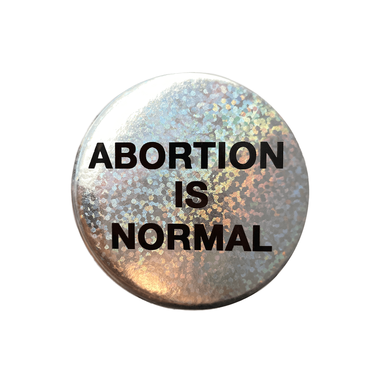 Silver pin that says abortion is normal