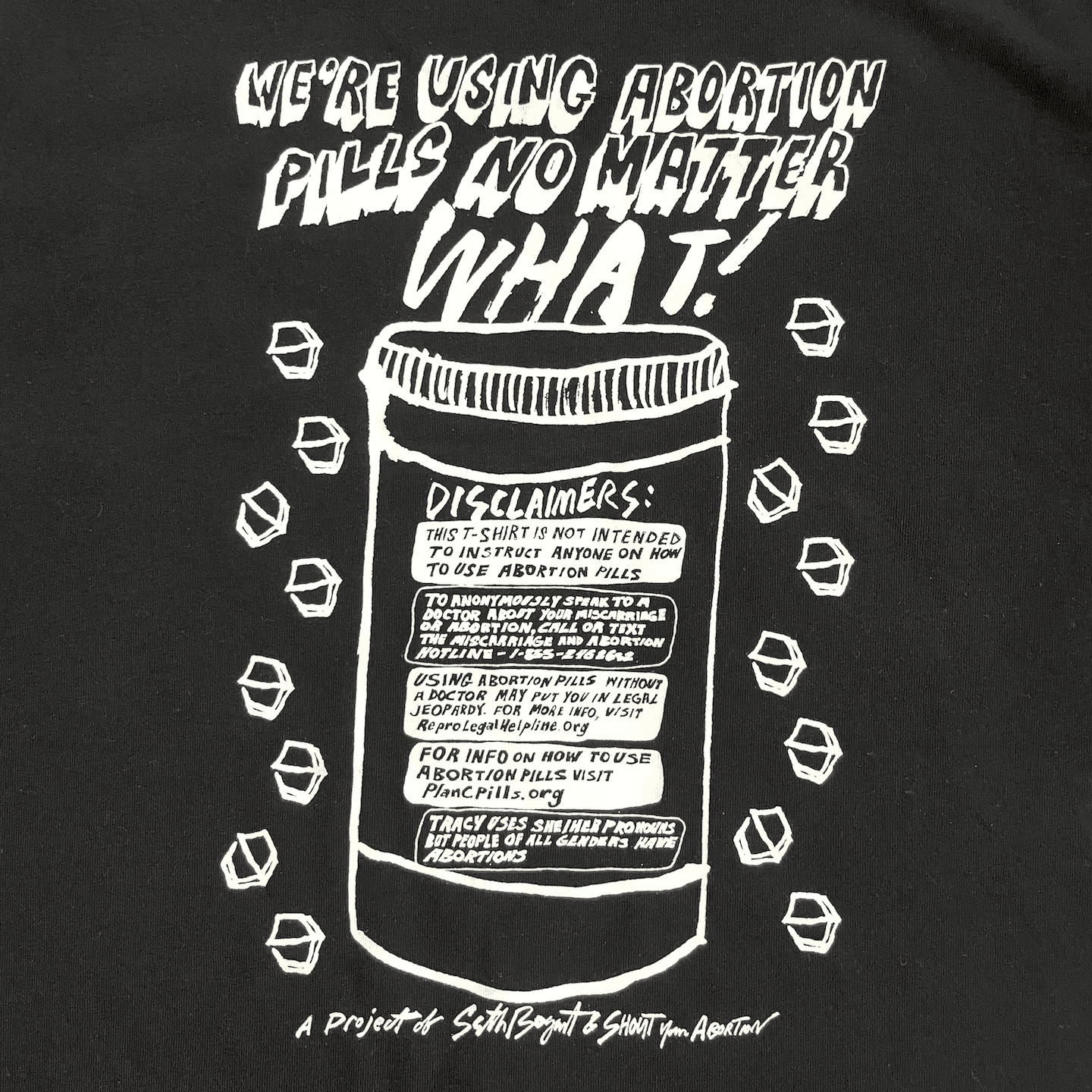 Close up of tee that says we're using abortion pills no matter what
