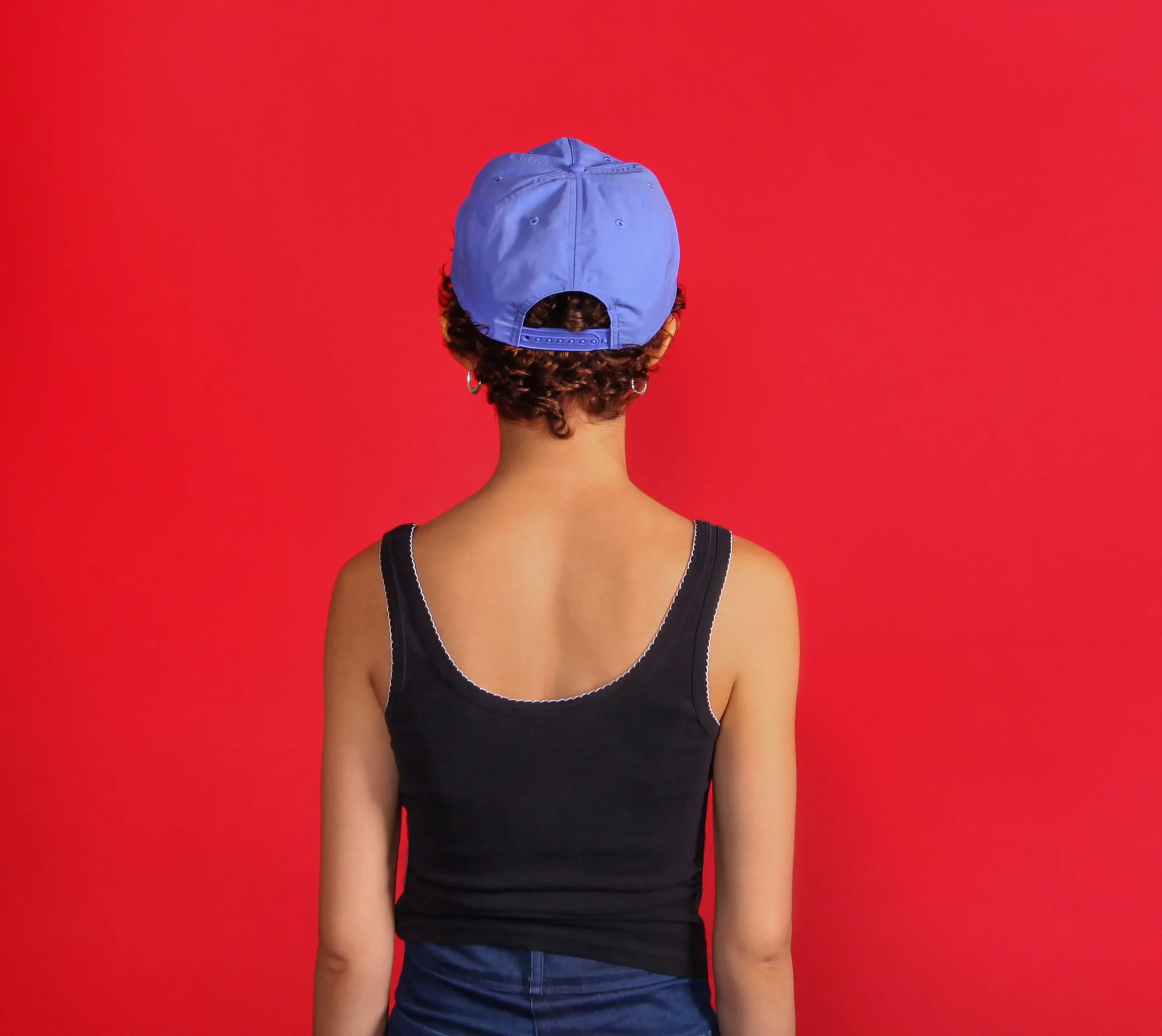 Model wearing abortion forever hat