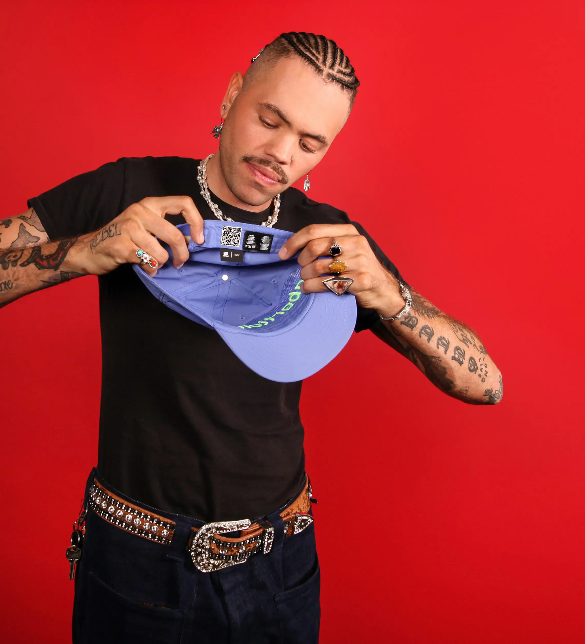 Model holding abortion forever hat